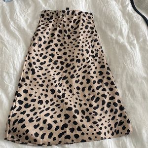 Satin printed skirt. Hits at calf length on 5’2 height